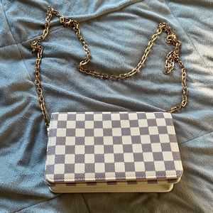 Clutch bag with gold chain